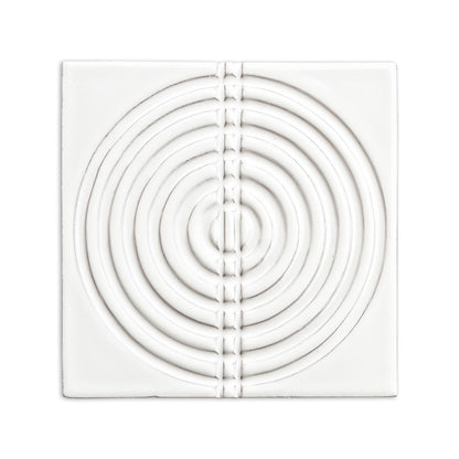 Glossy white 6x6 tile by Clay Imports, embossed with concentric circles and a central vertical dashed pattern.