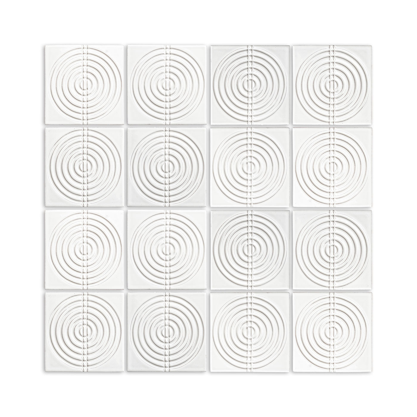 Off-white gloss ceramic tiles by Clay Imports, in a grid, each with raised concentric circles intersected by a vertical line.