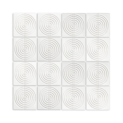 Off-white gloss ceramic tiles by Clay Imports, in a grid, each with raised concentric circles intersected by a vertical line.