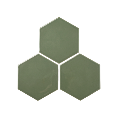 Three glossy hexagonal ceramic tiles in a muted sage green color, arranged in a triangular cluster on a solid white background.