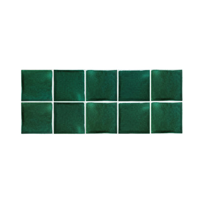 Forest green square glazed cotto pool waterline tiles by Clay Imports, arranged in two rows of five with white grout.