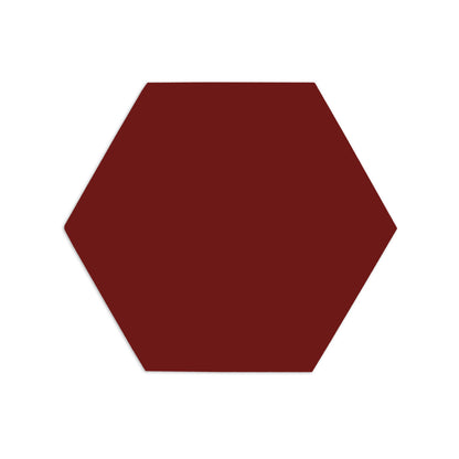 Oxblood red hexagon clay tile by Clay Imports, with a subtle shadow, presented from an overhead view.
