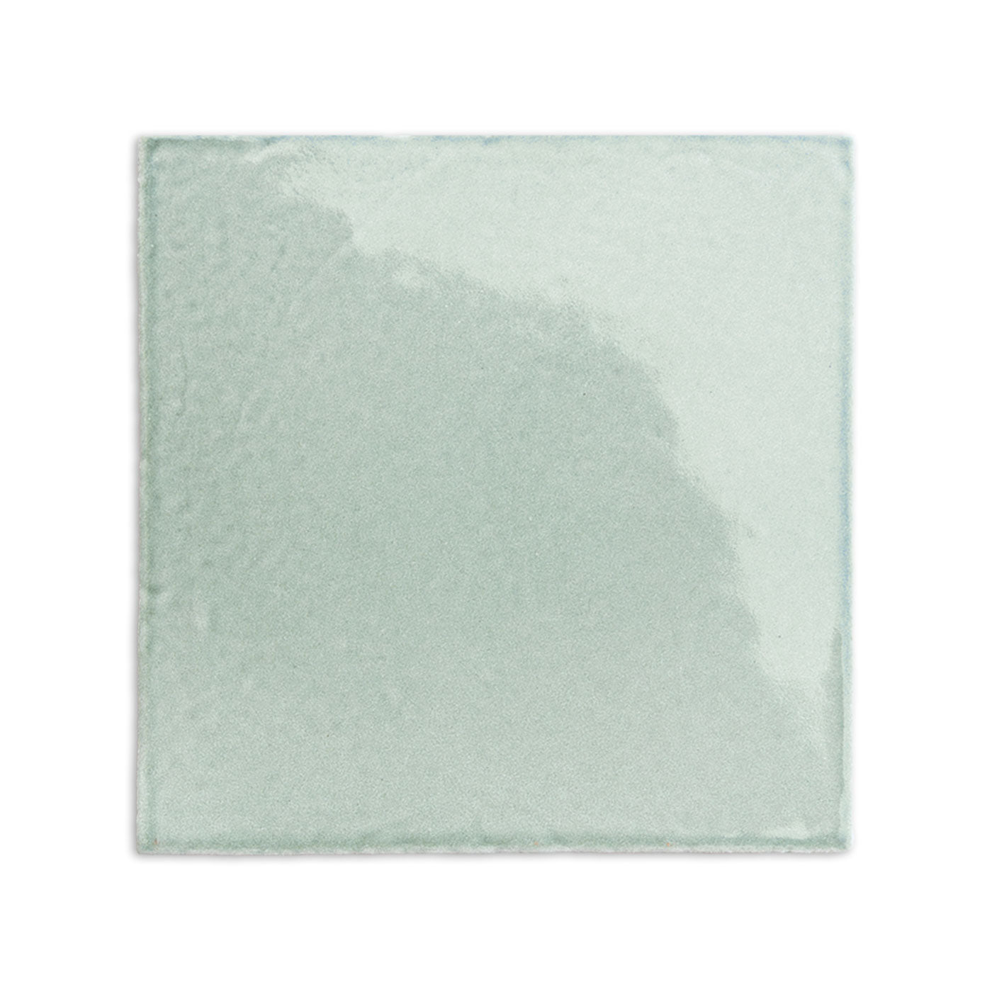 Light green glossy 6x6 tile by Clay Imports, with subtle surface variations and irregular edges.