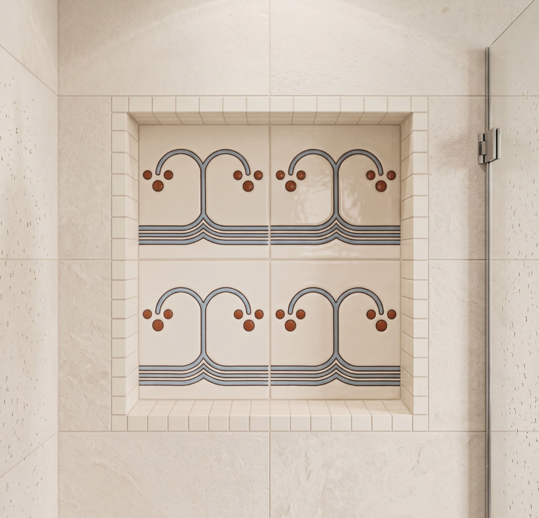 Decorative tile pattern in a shower niche with geometric design