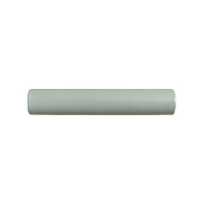 Green pencil liner tile by Clay Imports with a subtle texture, positioned horizontally.