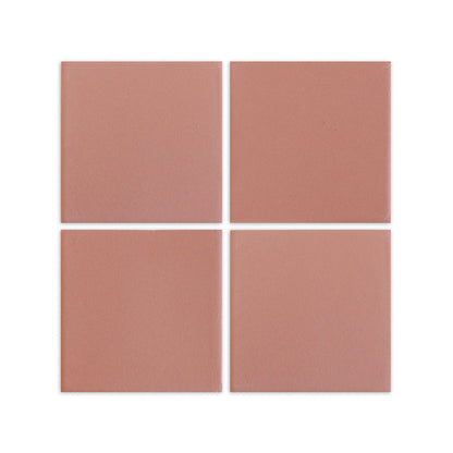 Pink granite clay tiles by Clay Imports, arranged in a grid with a matte, slightly textured finish.