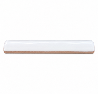 A single white glazed ceramic pencil tile sits horizontally against a plain white background.