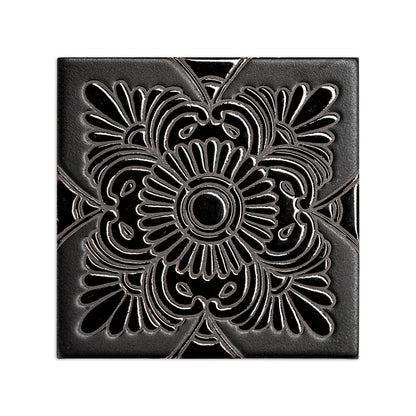 Black 6x6 ceramic tile with raised floral relief pattern, matte finish, central chrysanthemum design, symmetrical detailing, front view