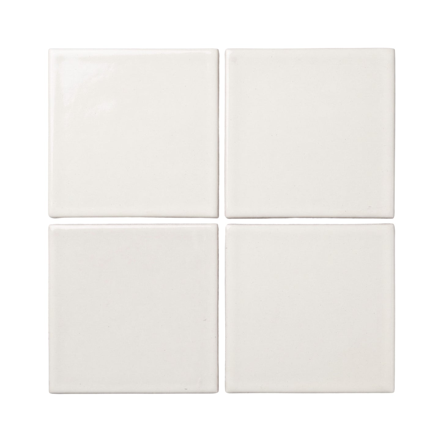 Four off-white square clay tiles by Clay Imports, arranged in a grid with smooth, varied textures.