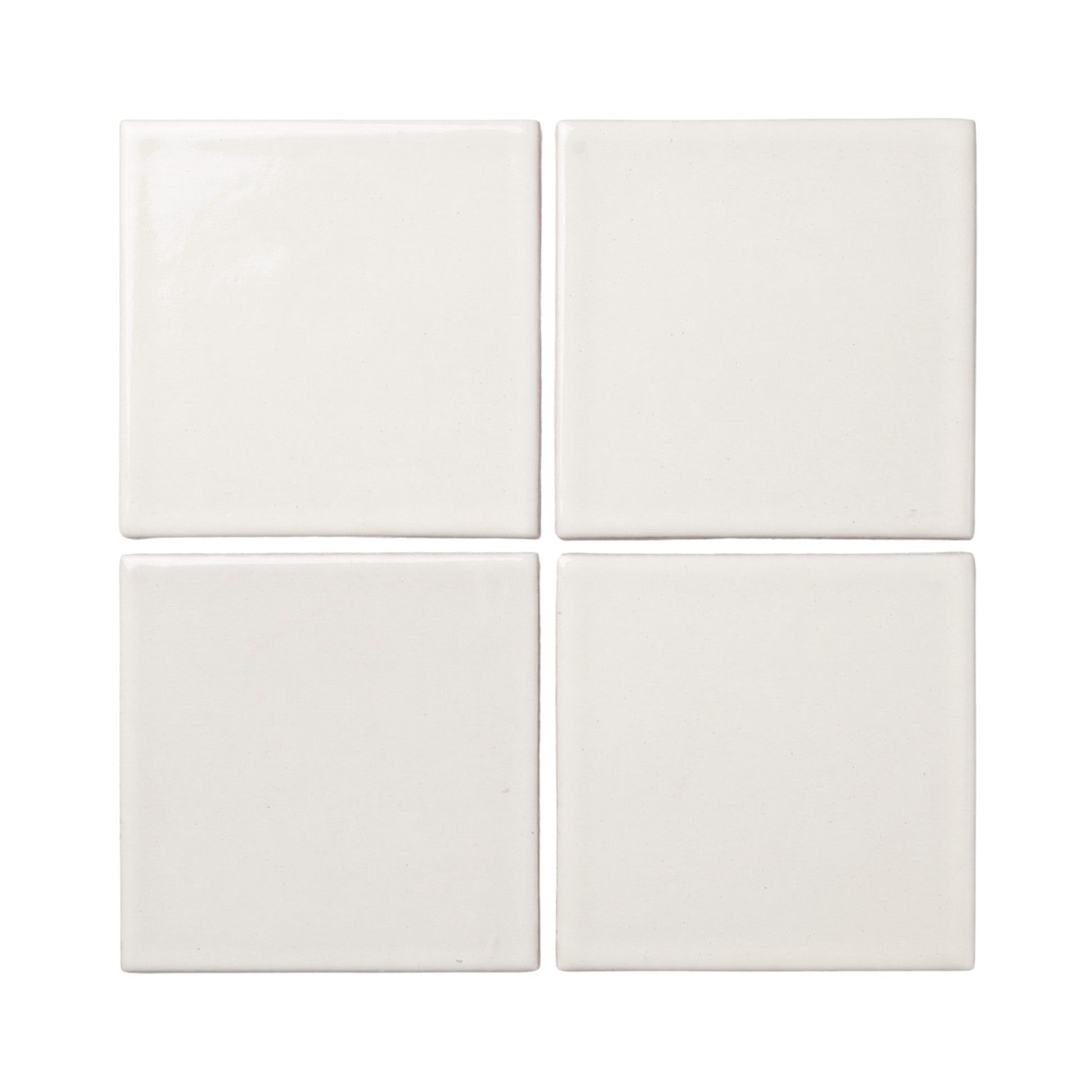 Four off-white square clay tiles by Clay Imports, arranged in a grid with smooth, varied textures.