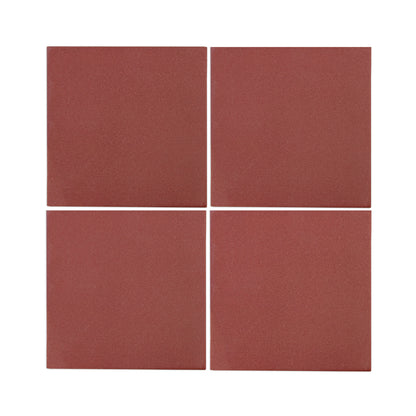 Four 6x6 wild berry clay tiles by Clay Imports, arranged in a grid, showcasing a textured reddish-brown surface.