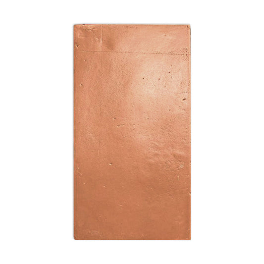Pressed terracotta red sample tile by Clay Imports, rectangular with a textured surface.
