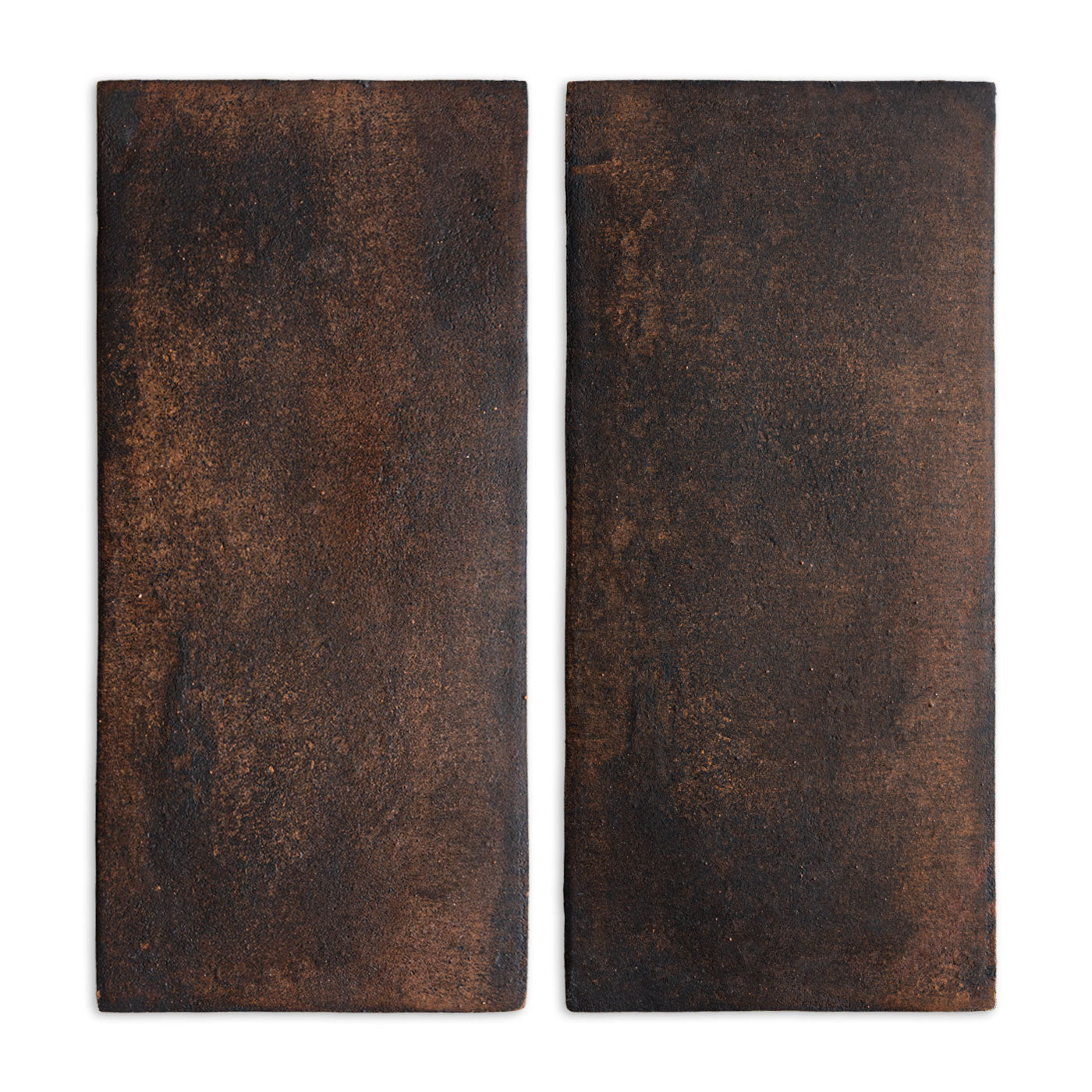 Dark brown Oxido Cotto tile by Clay Imports, featuring two rectangular textured pieces side-by-side.