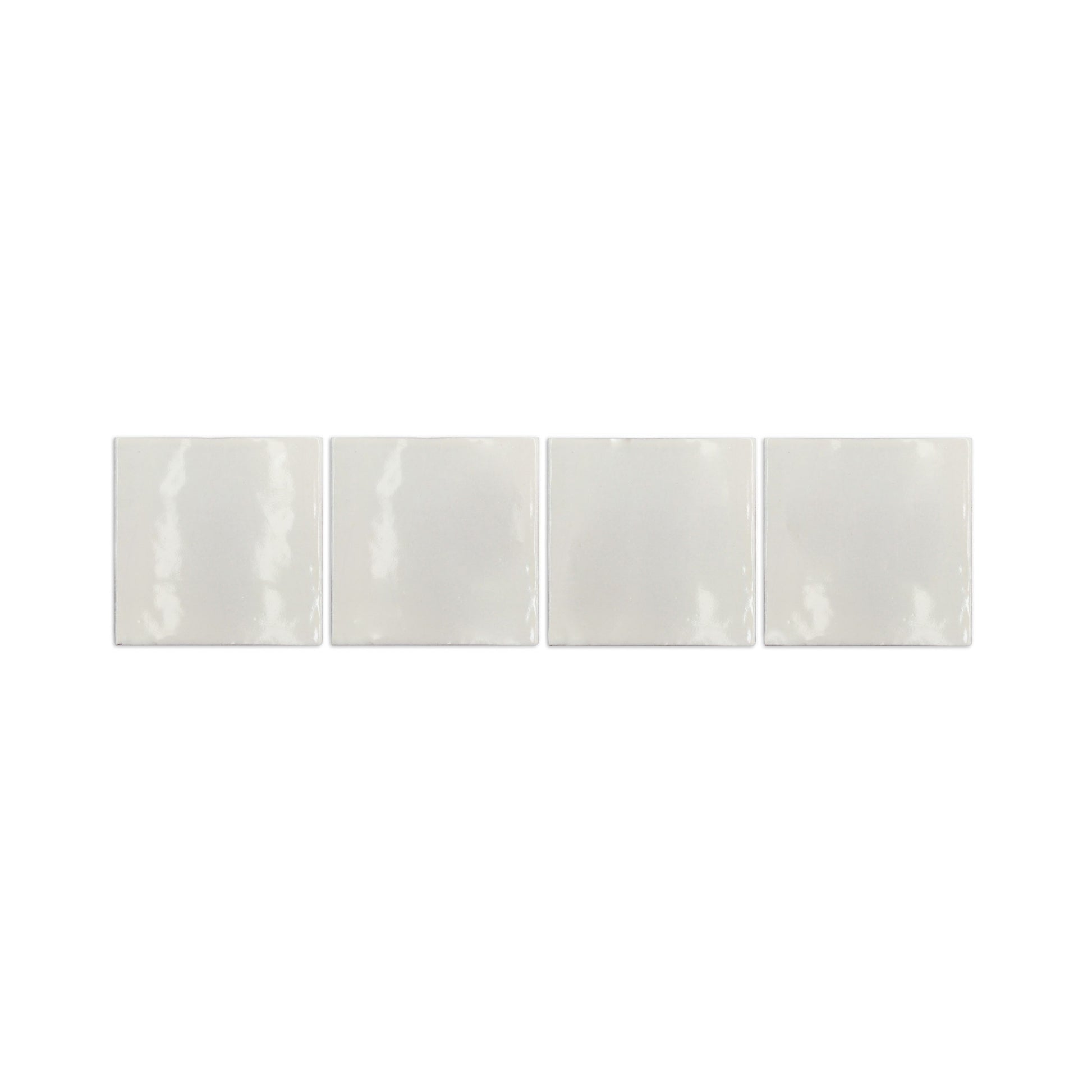 Champagne 6x6 glazed cotto pool waterline tiles by Clay Imports, arranged in a row with a glossy, subtly irregular surface.