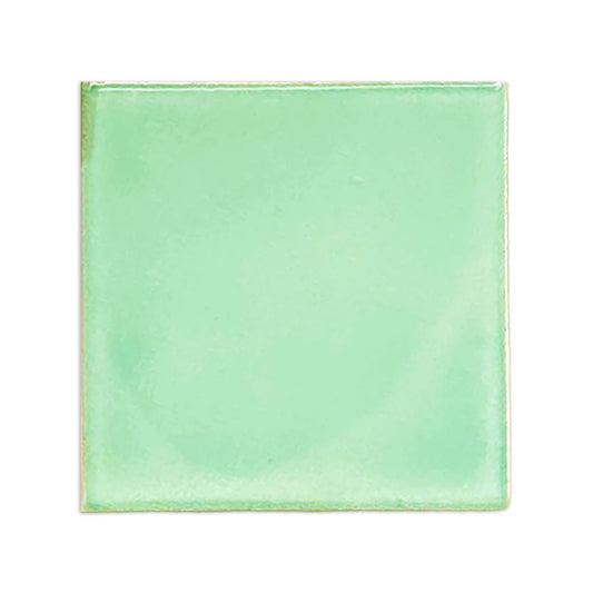 Light green square clay tile by Clay Imports with a glossy, slightly textured finish and subtle edge variations.