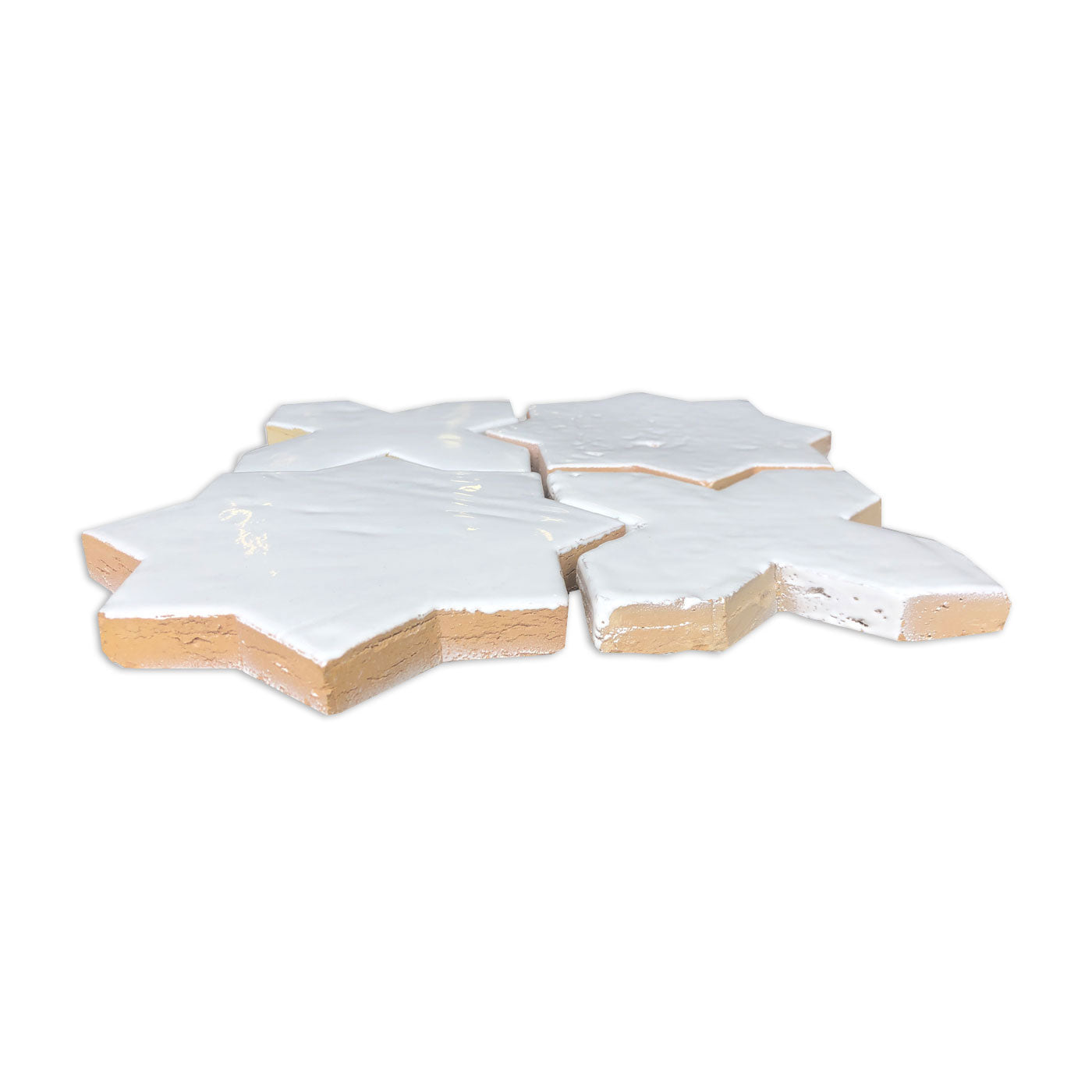 White gloss Glazed Terracotta Star and Cross tiles by Clay Imports, showing natural terracotta edges in a grouped view.