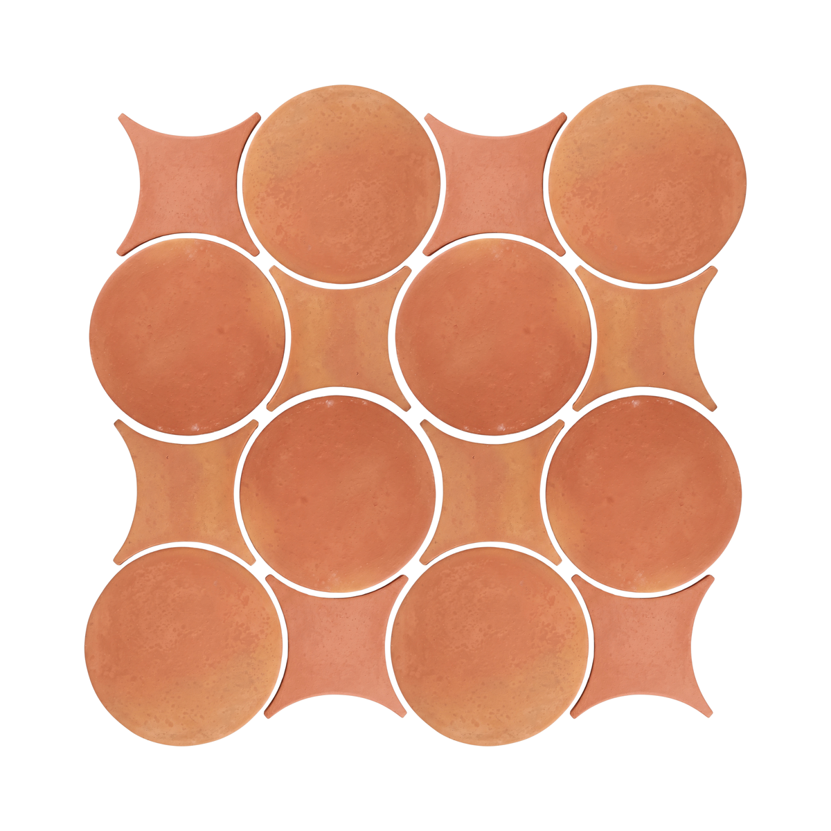 A pattern of terracotta round and star-shaped ceramic floor tiles displays a warm, earthy tone.