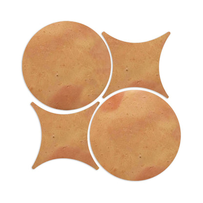 Smooth satin terracotta tiles by Clay Imports in warm orange-brown, featuring circular and star-like shapes.