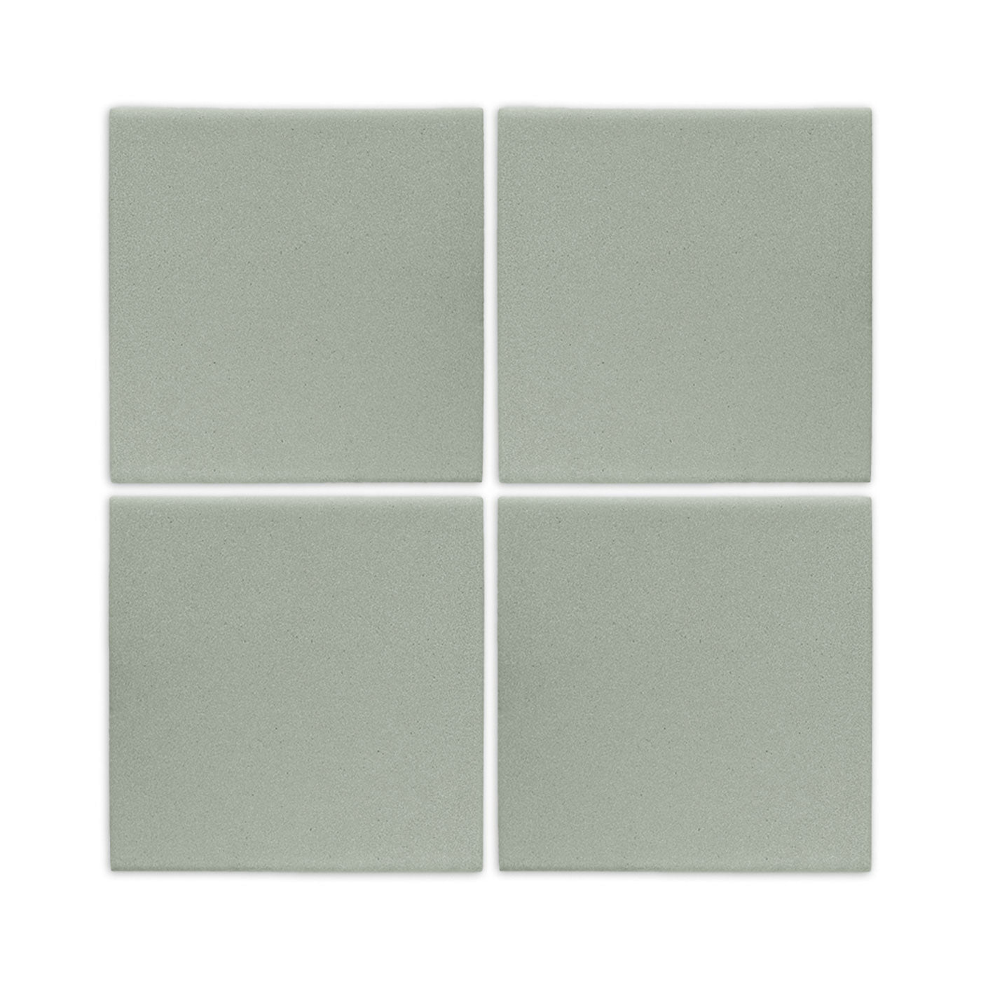 Four agave green square clay tiles by Clay Imports with a matte finish and narrow white grout lines.