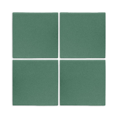 Cilantro green square clay tiles by Clay Imports arranged in a grid with a textured finish.