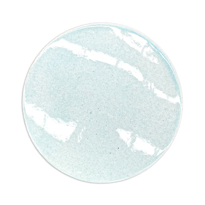 Light blue crackle-glazed circular ceramic plate by Rombo & Circle, featuring subtle speckles and glossy finish, top-down view