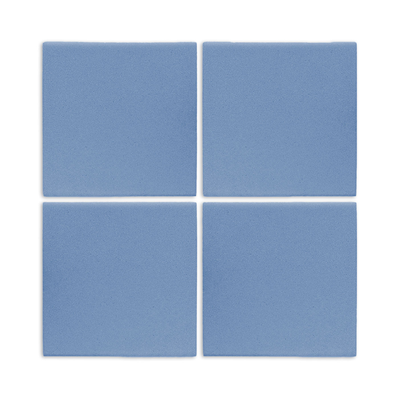 Four denim blue square clay tiles by Clay Imports, arranged in a grid with a matte, textured surface.