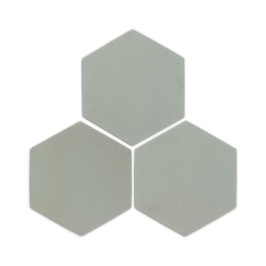 Agave green hexagon clay tiles by Clay Imports, arranged in a cluster with a matte finish and subtle shadows.