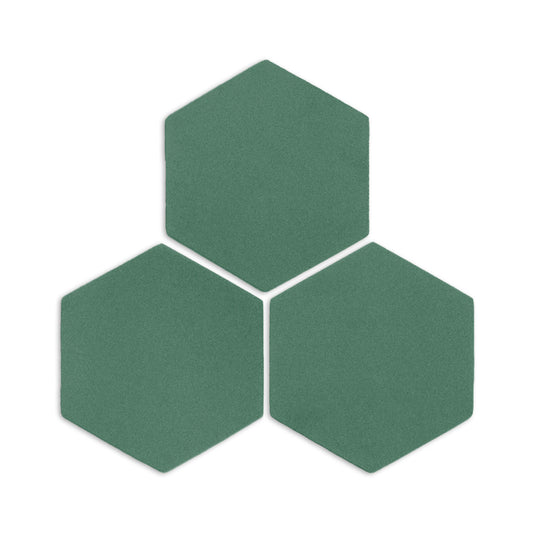 Three Cilantro green hexagonal clay tiles by Clay Imports, arranged in a cluster showing fine texture.