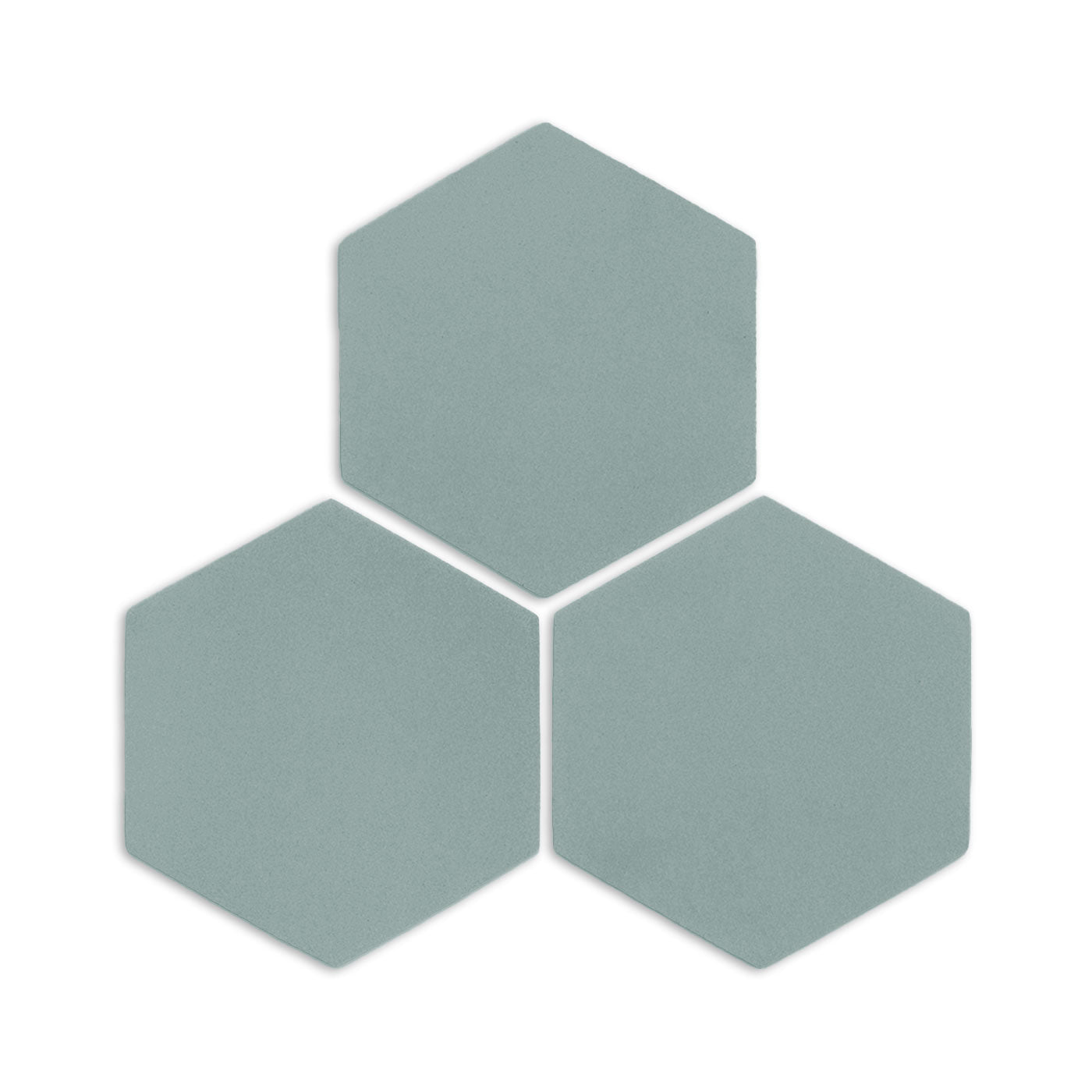 Three hexagon clay tiles in sage green by Clay Imports, arranged in a cluster with visible texture and subtle shadows.