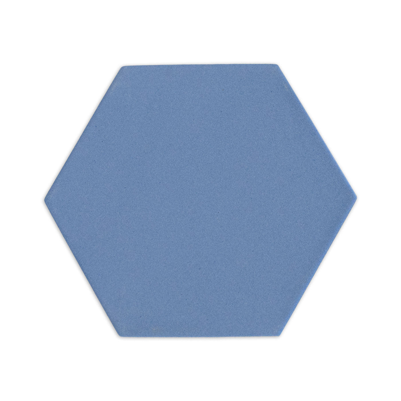Hexagon tile sample in denim blue by Clay Imports with a matte, textured finish, isolated on white.