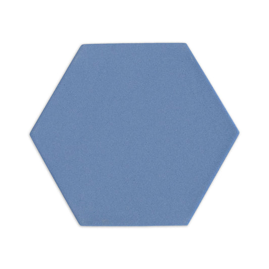 Hexagon tile sample in denim blue by Clay Imports with a matte, textured finish, isolated on white.