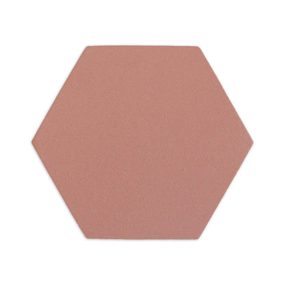 Pink hexagon clay tile by Clay Imports with a fine, matte texture on a white background.