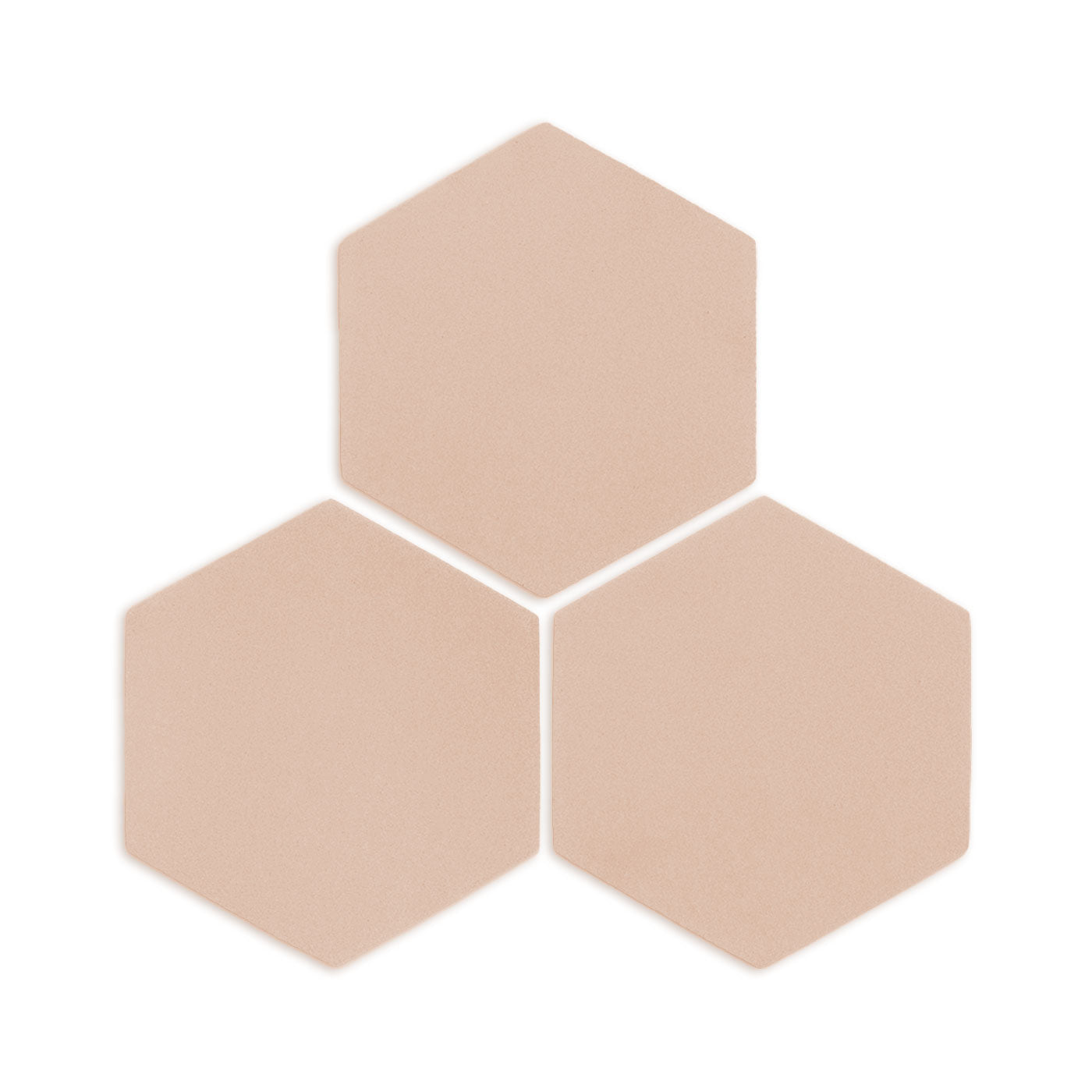 Hexagon Sand Rattler clay tile by Clay Imports, three light beige tiles with subtle texture arranged in a cluster, casting shadows.