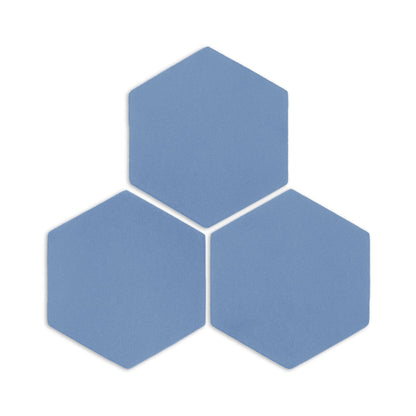 Three denim blue hexagonal clay tiles by Clay Imports, with a subtle matte texture on a white background.
