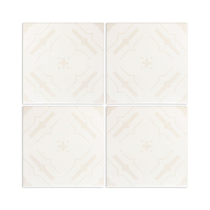 Light beige Nakbe Dew square tiles by Clay Imports, featuring a symmetrical geometric pattern.