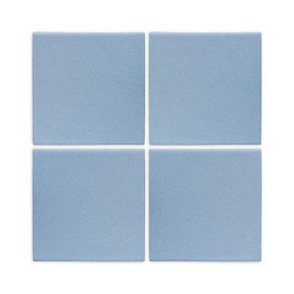 Light blue square clay tiles by Clay Imports, arranged in a 2x2 grid with subtle texture.