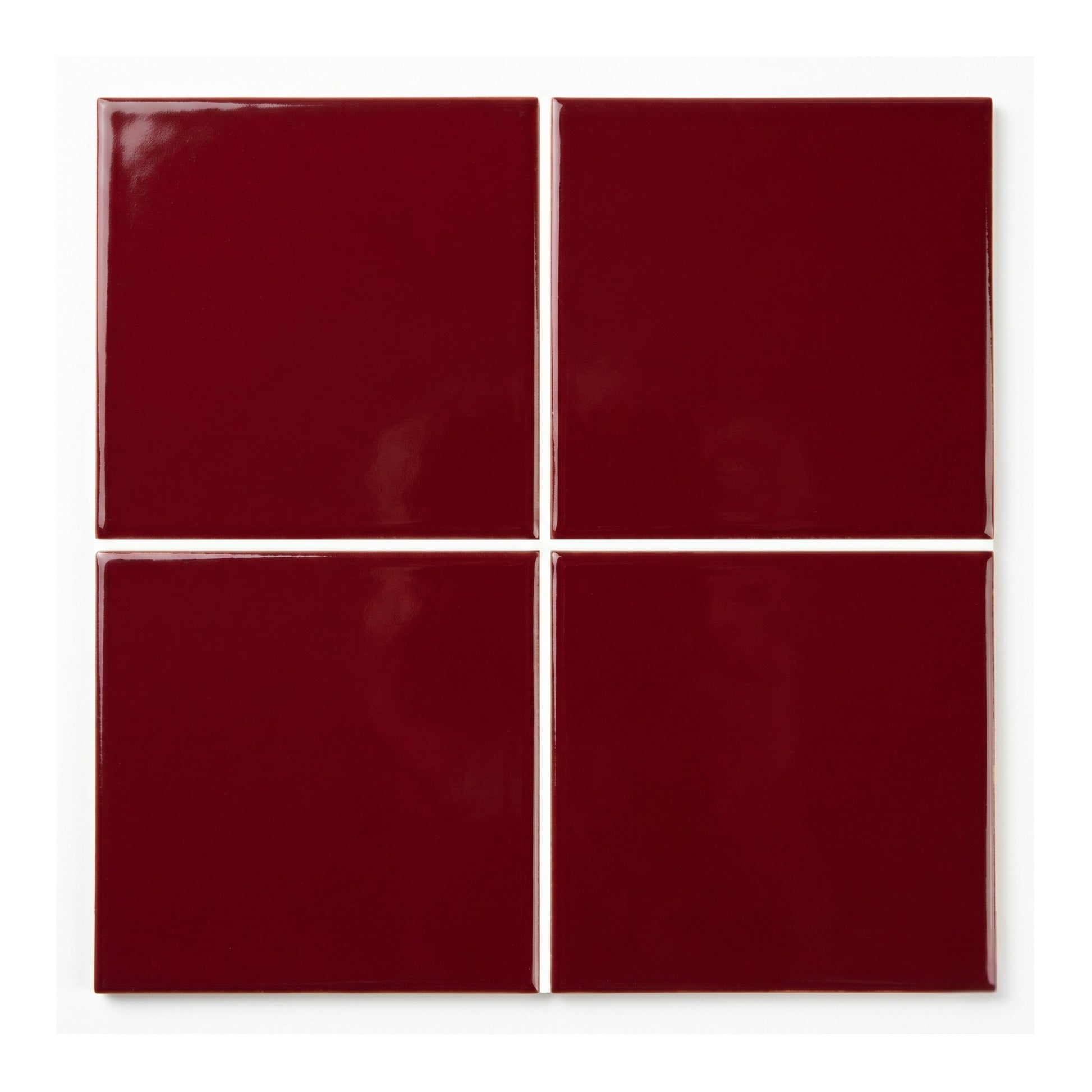 Oxblood glossy square clay tiles by Clay Imports, arranged in a 2x2 grid with white grout.