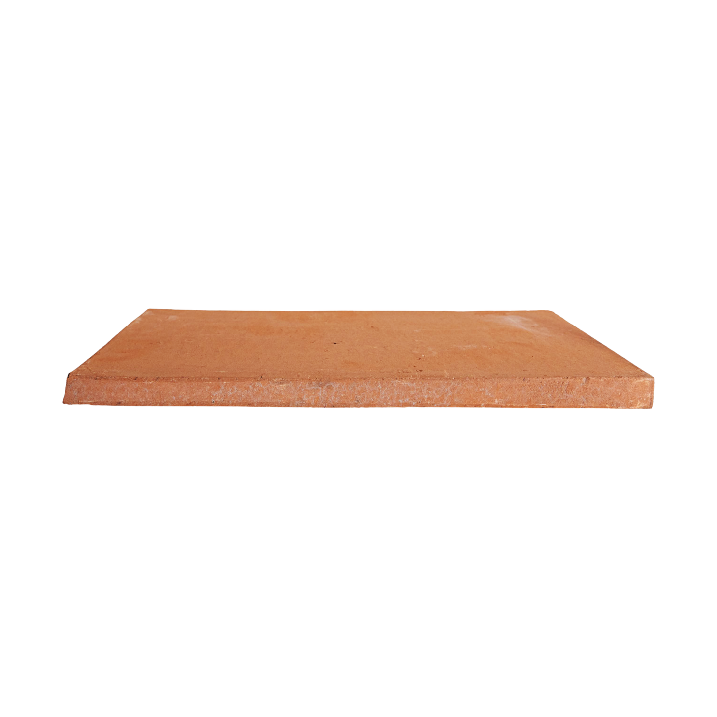 Baked thin 8x16 terracotta paver by Clay Imports in a reddish-orange hue, shown from a low side angle with a slightly rough texture.