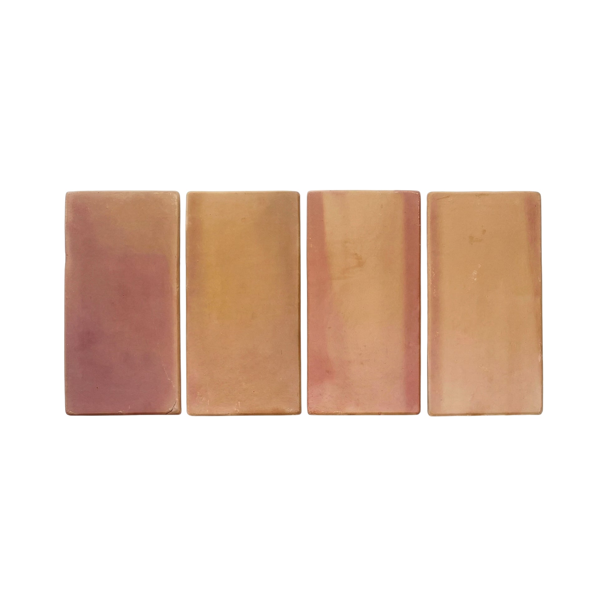 Tan and reddish-brown rectangular terracotta tile with rounded edges by Clay Imports, with four tiles displayed side-by-side.