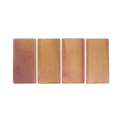 Tan and reddish-brown rectangular terracotta tile with rounded edges by Clay Imports, with four tiles displayed side-by-side.