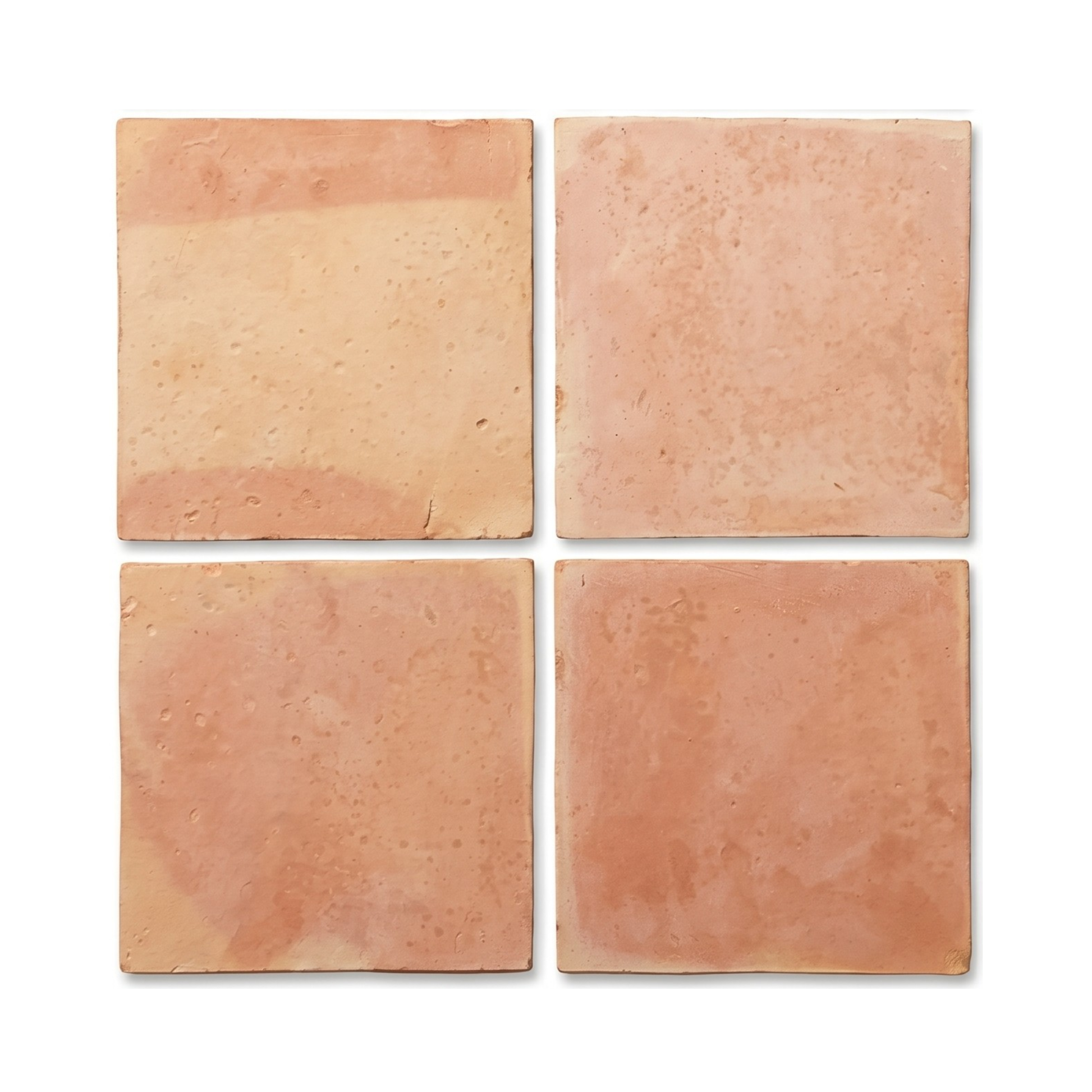 Four smooth matte terracotta tiles by Clay Imports, displaying natural reddish hues and rough edges.