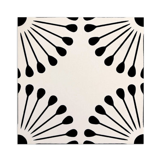 Atomic Vocho Pitch Black tile sample by Clay Imports, showing abstract black sunbursts on an off-white background.
