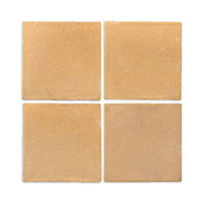 Sandy beige Cotto tiles by Clay Imports, arranged as four matte, rough squares.