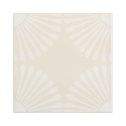 Off-white decorative tile by Clay Imports with a subtle radial sunburst pattern in each corner.