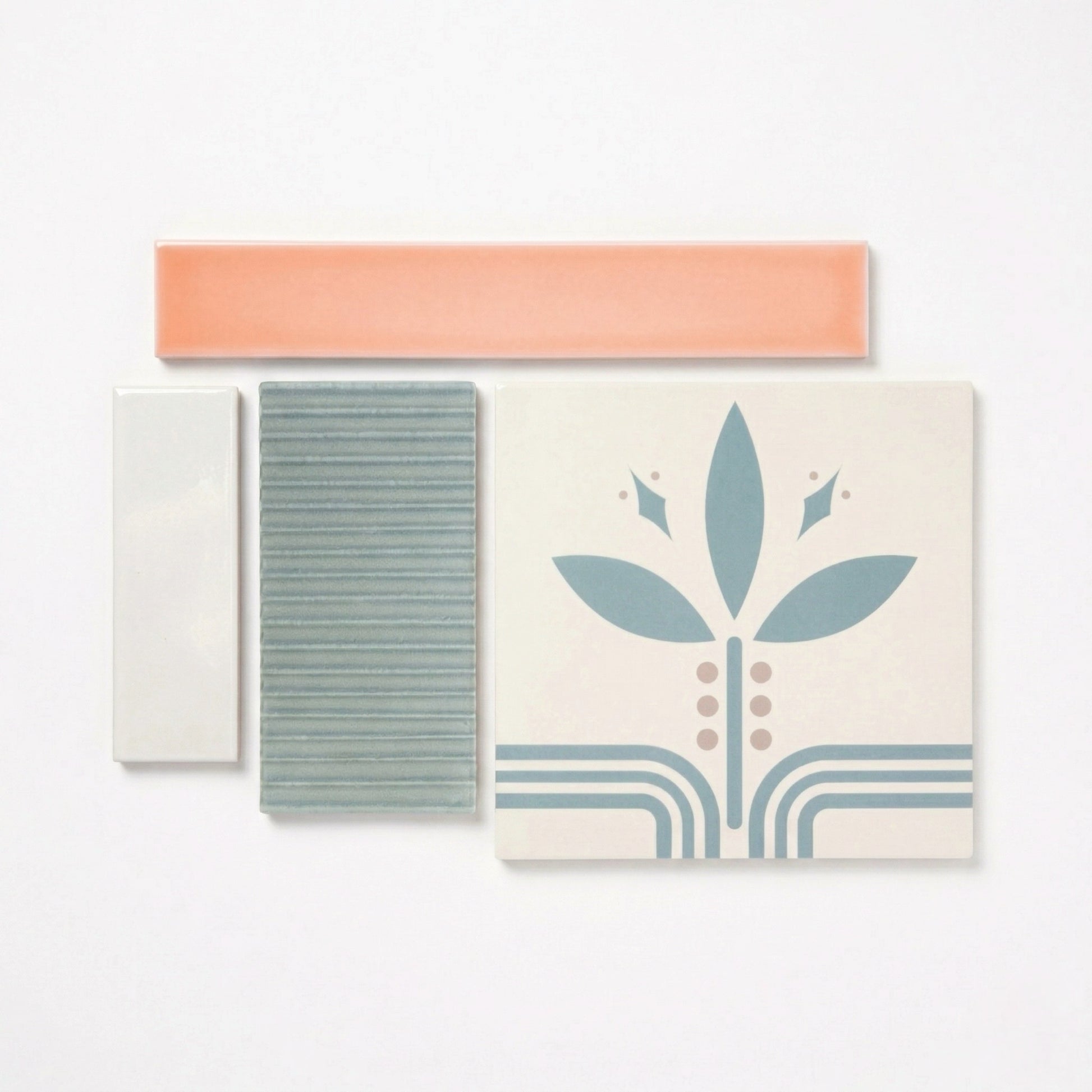 Tile samples from Clay Imports, featuring coral, off-white, ribbed sage green, and patterned floral square tiles.