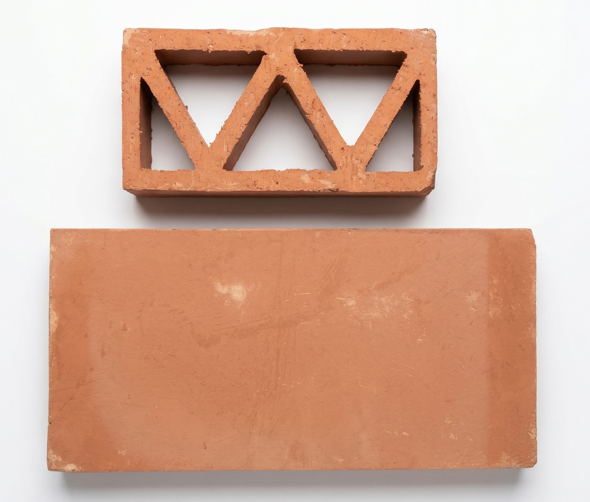 Terracotta breeze block with triangular cutouts by Clay Imports Breeze Blocks, shown above a solid rectangular tile on a white background.