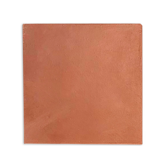 D'Hanis Red Terracotta Sample by Clay Imports, a square tile with an earthy, textured surface and subtle bumps.