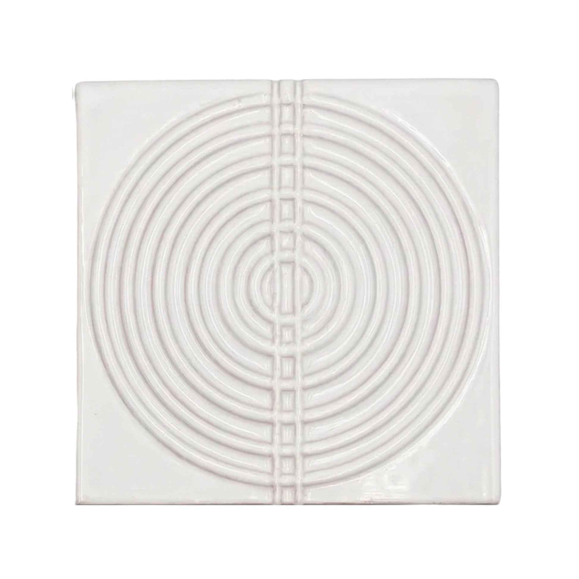 Square sample tile in Dusk Perla gloss finish by Clay Imports, with a raised pattern of concentric circles bisected by squares.