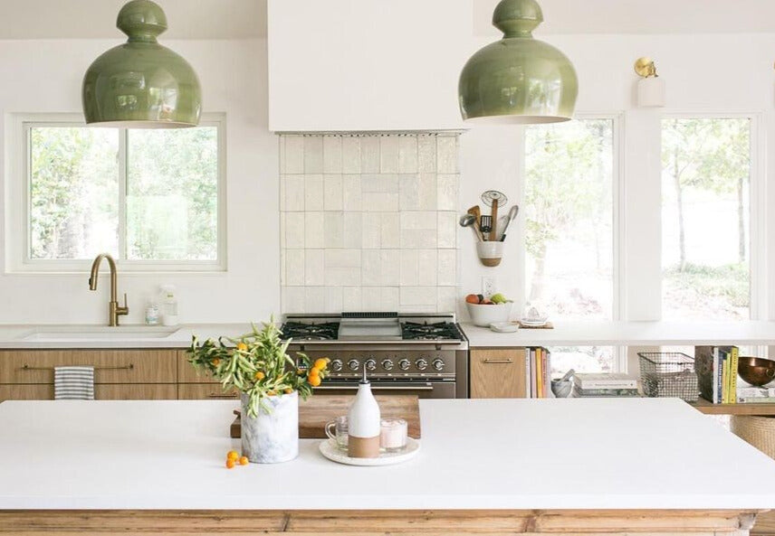 Glazed smooth Blanco 4x8 terracotta tile by Clay Imports, installed as a kitchen backsplash with subtle variations.