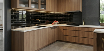 Grackle black glossy subway clay tiles by Clay Imports, forming a kitchen backsplash under warm cabinet lighting.